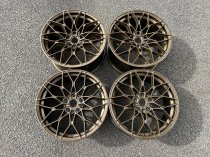NEW 19 INCH 1000X CROSS SPOKE STYLE ALLOY WHEELS IN BRONZE WITH DEEPER 9.5" REAR 5x120