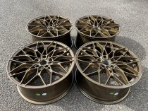 NEW 19 INCH 1000X CROSS SPOKE STYLE ALLOY WHEELS IN BRONZE WITH DEEPER 9.5" REAR 5x120