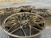 NEW 19 INCH 1000X CROSS SPOKE STYLE ALLOY WHEELS IN BRONZE WITH DEEPER 9.5" REAR 5x120